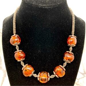 Amber Necklace Unknown Metal (non-magnetic) 7 Beads Green Fluoresce